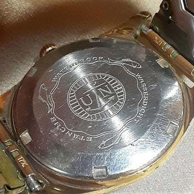 ULYSSE NARDIN JUBILEE 4000 AUTOMATIC GOLD DIAL DATE STRETCH BAND MEN'S WATCH