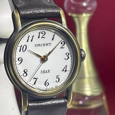 ORIENT QUARTZ LADIES WRISTWATCH WHITE DIAL JAPAN MADE ROUND FACE WHITE DIAL