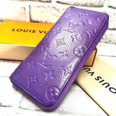 LOUIS VUITTON M81636 TAURILLON MONOGRAM PURPLE ZIPPY VERTICAL WALLET