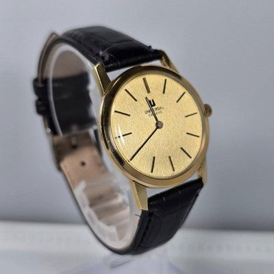 UNIVERSAL GENEVE 542136 VINTAGE MANUAL WIND LINEN DIAL GOLD PLATED WATCH