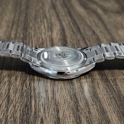 CITIZEN THE CITIZEN CTQ57-0062 QUARTZ ANNUAL ACCURACY PERPETUAL CALENDAR WATCH