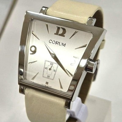 CORUM BOUTIQUE TRAPEZE 106.404.20 SILVER DIAL STAINLESS STEEL QUARTZ MENS WATCH