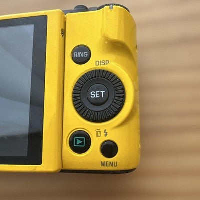 CASIO EXILIM EX-ZR1100 16.1MP YELLOW DIGITAL CAMERA W/BATTERY,CHARGER