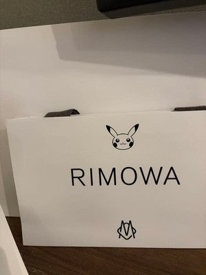 RIMOWA POKEMON CHARIZARD LEATHER CHARM LIMITED JAPAN EXCLUSIVE NEW AUTHENTIC