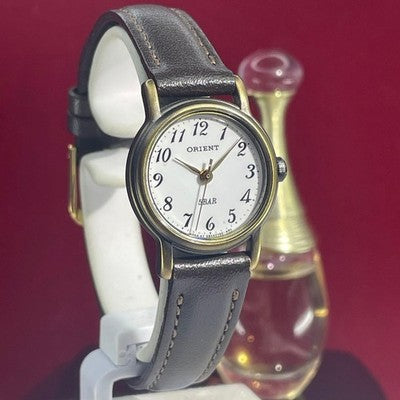 ORIENT QUARTZ LADIES WRISTWATCH WHITE DIAL JAPAN MADE ROUND FACE WHITE DIAL