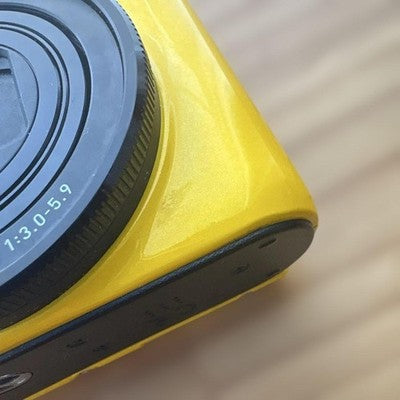 CASIO EXILIM EX-ZR1100 16.1MP YELLOW DIGITAL CAMERA W/BATTERY,CHARGER