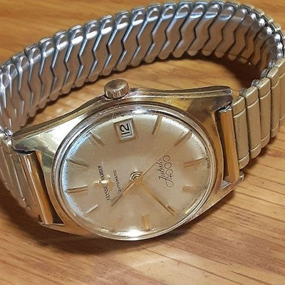 ULYSSE NARDIN JUBILEE 4000 AUTOMATIC GOLD DIAL DATE STRETCH BAND MEN'S WATCH