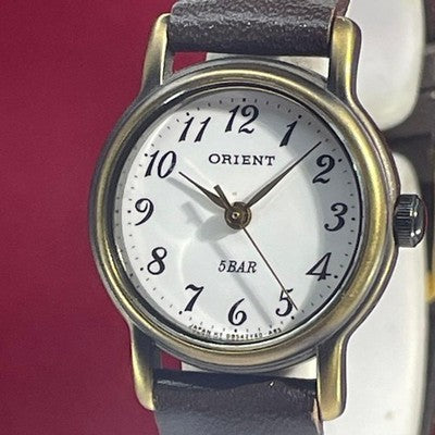ORIENT QUARTZ LADIES WRISTWATCH WHITE DIAL JAPAN MADE ROUND FACE WHITE DIAL