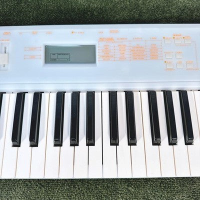 YAMAHA EOS BX SYNTHESIZER W/ ORIGINAL BOX, MANUALS, CD-ROM