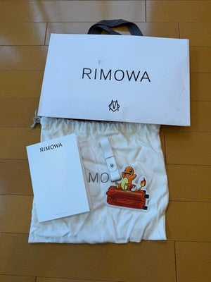 POKÉMON × RIMOWA CHARMANDER LEATHER CHARM JAPAN EXCLUSIVE NEW W/ SHOPPER TAG