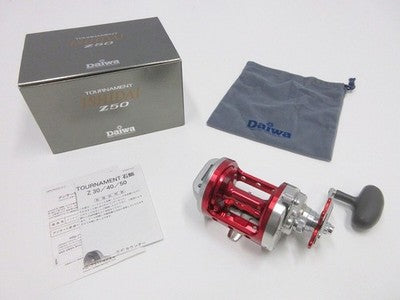 DAIWA TOURNAMENT ISHIDAI Z50 BAITCASTING REEL LURE FROM JAPAN RED SILVER MINT
