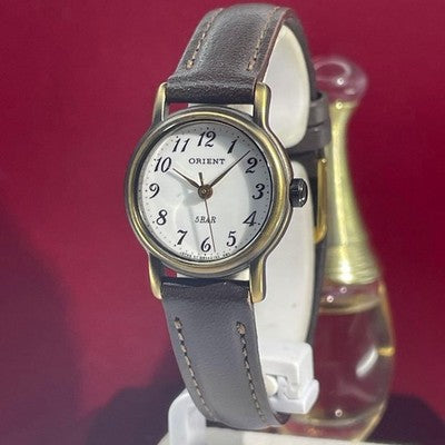ORIENT QUARTZ LADIES WRISTWATCH WHITE DIAL JAPAN MADE ROUND FACE WHITE DIAL