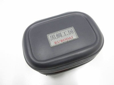 KURODAI KOBO REEL CASE 12 CM IN HEIGHT, 15 CM IN WIDTH, AND 7 CM IN DEPTH.
