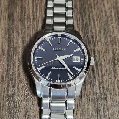 CITIZEN THE CITIZEN CTQ57-0062 QUARTZ ANNUAL ACCURACY PERPETUAL CALENDAR WATCH