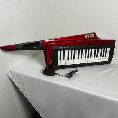 KORG RK-100S RED SHOULDER KEYBOARD SYNTHESIZER WITH ADAPTER