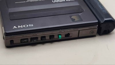SONY WM-150 CASSETTE WALKMAN PORTABLE PLAYER WITH COVER FOR PARTS OR NOT WORKING