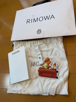 POKÉMON × RIMOWA CHARMANDER LEATHER CHARM JAPAN EXCLUSIVE NEW W/ SHOPPER TAG