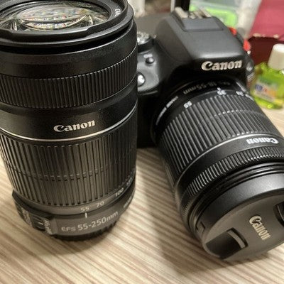 CANON EOS KISS X7 DIGITAL SLR CAMERA WITH TWO CANON EFS LENSES BLACK