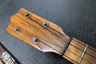 KAMAKA HF-4 BARITONE UKULELE, CRAFTED FROM PREMIUM HAWAIIAN KOA WOOD.
