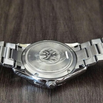 CITIZEN THE CITIZEN CTQ57-0062 QUARTZ ANNUAL ACCURACY PERPETUAL CALENDAR WATCH