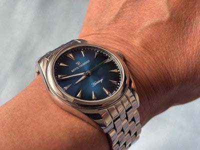 REVUE THOMMEN HERITAGE AUTOMATIC MEN WATCH BLUE DIAL SKELETON BACK SWISS