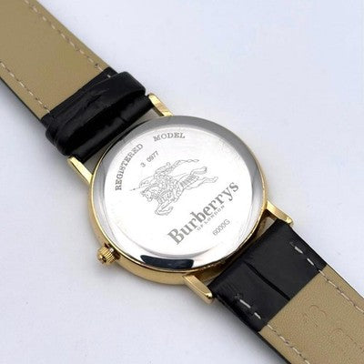 BURBERRY MEN'S QUARTZ GOLD SHELL ROMAN WRISTWATCH ROUND FACE LEATHER BELT
