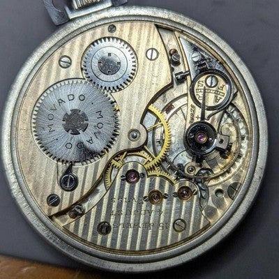 MOVADO VINTAGE POCKET WATCH 15 JEWELS ENAMEL DIAL MANUAL WIND W/ CHAIN WORKING