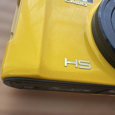 CASIO EXILIM EX-ZR1100 16.1MP YELLOW DIGITAL CAMERA W/BATTERY,CHARGER