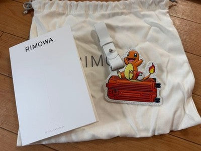POKÉMON × RIMOWA CHARMANDER LEATHER CHARM JAPAN EXCLUSIVE NEW W/ SHOPPER TAG