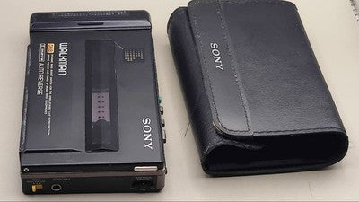 SONY WM-150 CASSETTE WALKMAN PORTABLE PLAYER WITH COVER FOR PARTS OR NOT WORKING