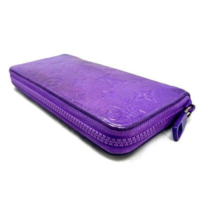 LOUIS VUITTON M81636 TAURILLON MONOGRAM PURPLE ZIPPY VERTICAL WALLET