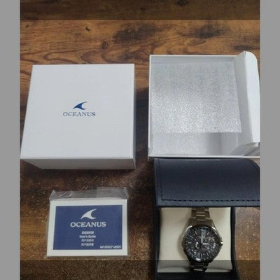 CASIO OCEANUS GPS HYBRID RADIO SOLAR WATCH OCW-G1000DB-1AJF UNUSED W/DLC BEZEL