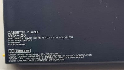 SONY WM-150 CASSETTE WALKMAN PORTABLE PLAYER WITH COVER FOR PARTS OR NOT WORKING