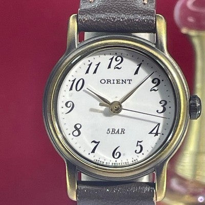 ORIENT QUARTZ LADIES WRISTWATCH WHITE DIAL JAPAN MADE ROUND FACE WHITE DIAL