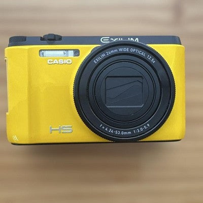 CASIO EXILIM EX-ZR1100 16.1MP YELLOW DIGITAL CAMERA W/BATTERY,CHARGER