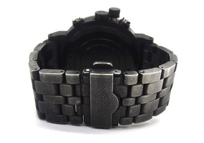 NIXON A153-001 TRADER QUARTZ WATCH 45MM BLACK DIAL - SCRATCHES ON BEZEL, DIRT