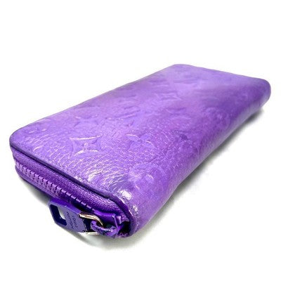 LOUIS VUITTON M81636 TAURILLON MONOGRAM PURPLE ZIPPY VERTICAL WALLET