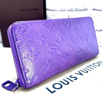 LOUIS VUITTON M81636 TAURILLON MONOGRAM PURPLE ZIPPY VERTICAL WALLET