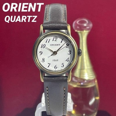 ORIENT QUARTZ LADIES WRISTWATCH WHITE DIAL JAPAN MADE ROUND FACE WHITE DIAL